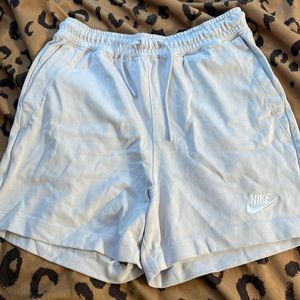 Beige Nike shorts